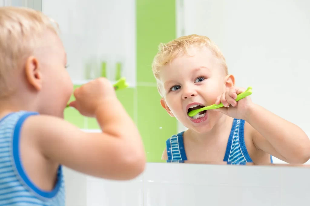20 Tips for Brushing Kids’ Teeth for Healthier Smiles Kid Brushing his Teeth